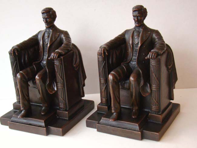 A wonderful pair of "Lincoln in the Chair" bookends made by Jenning Brothers circa 1922-1925
